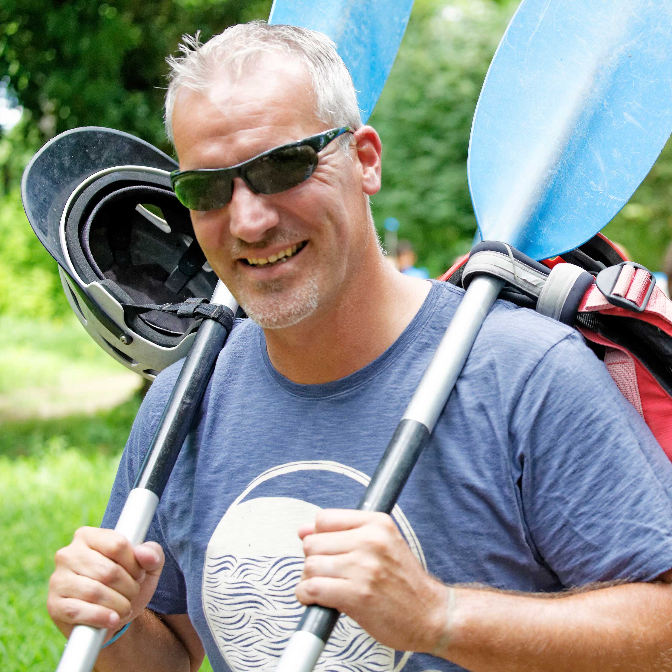 Teacher in a canoe at PGL